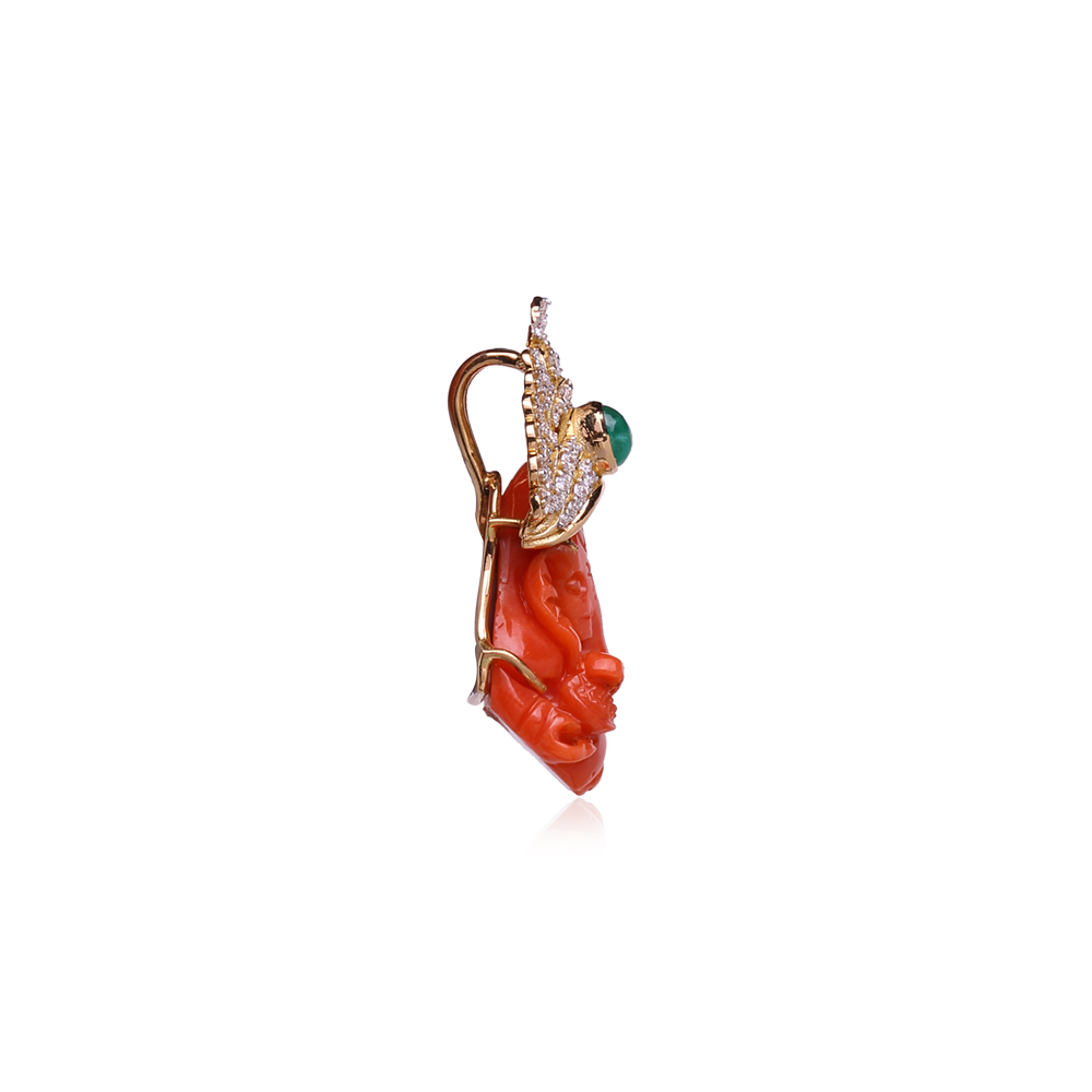 Coral Stone Ganesha Pendant with Emerald studded Mukut Coral Stone Ganesha Pendant with Emerald studded Mukut
