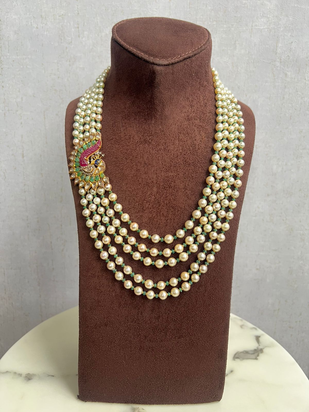 Unisex pearl mala with peacock side pendant