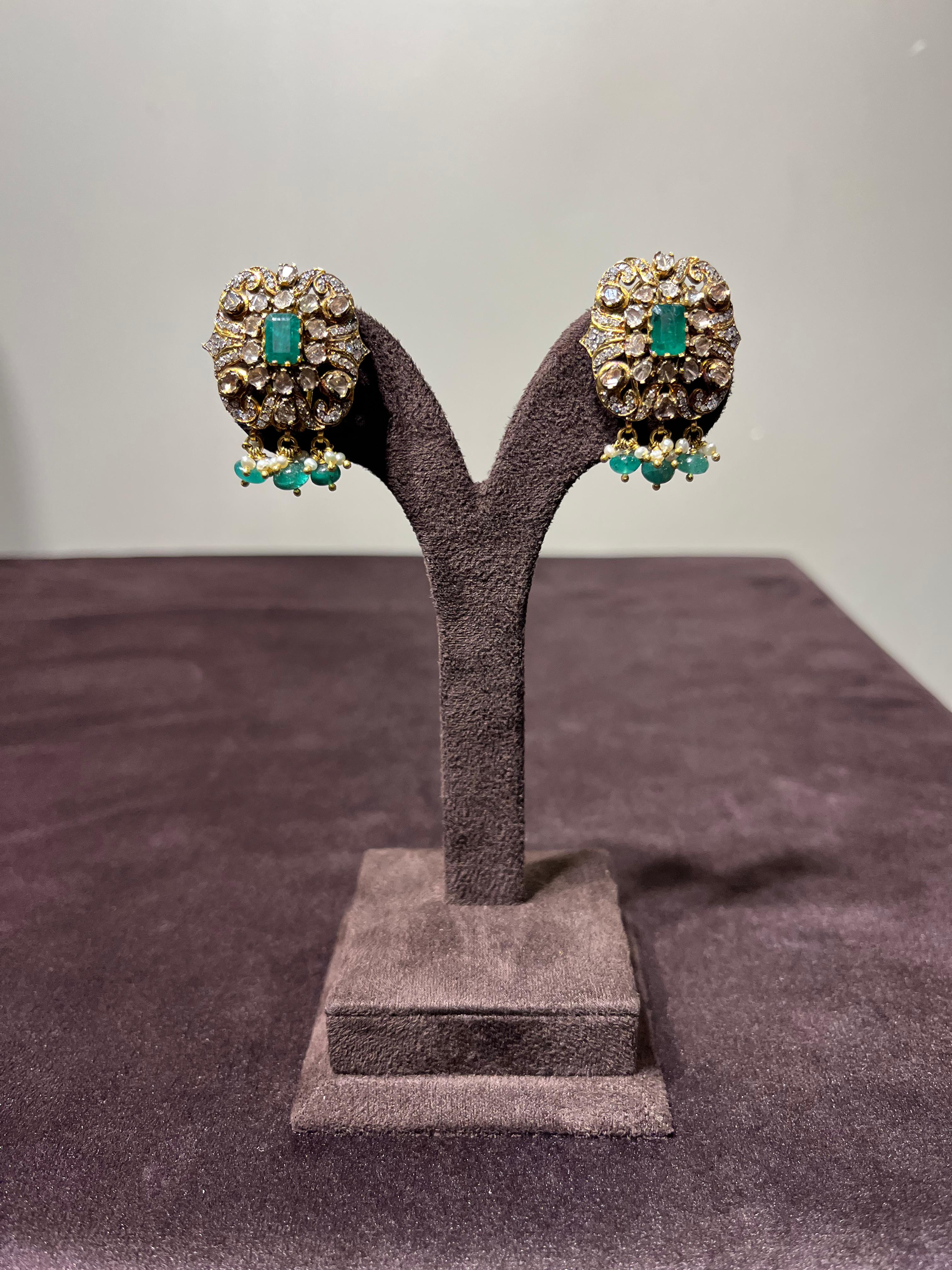 Polki Pendant with Emerald drop and Burmese Ruby Earrings Polki Pendant with Emerald drop and Burmese Ruby Earrings
