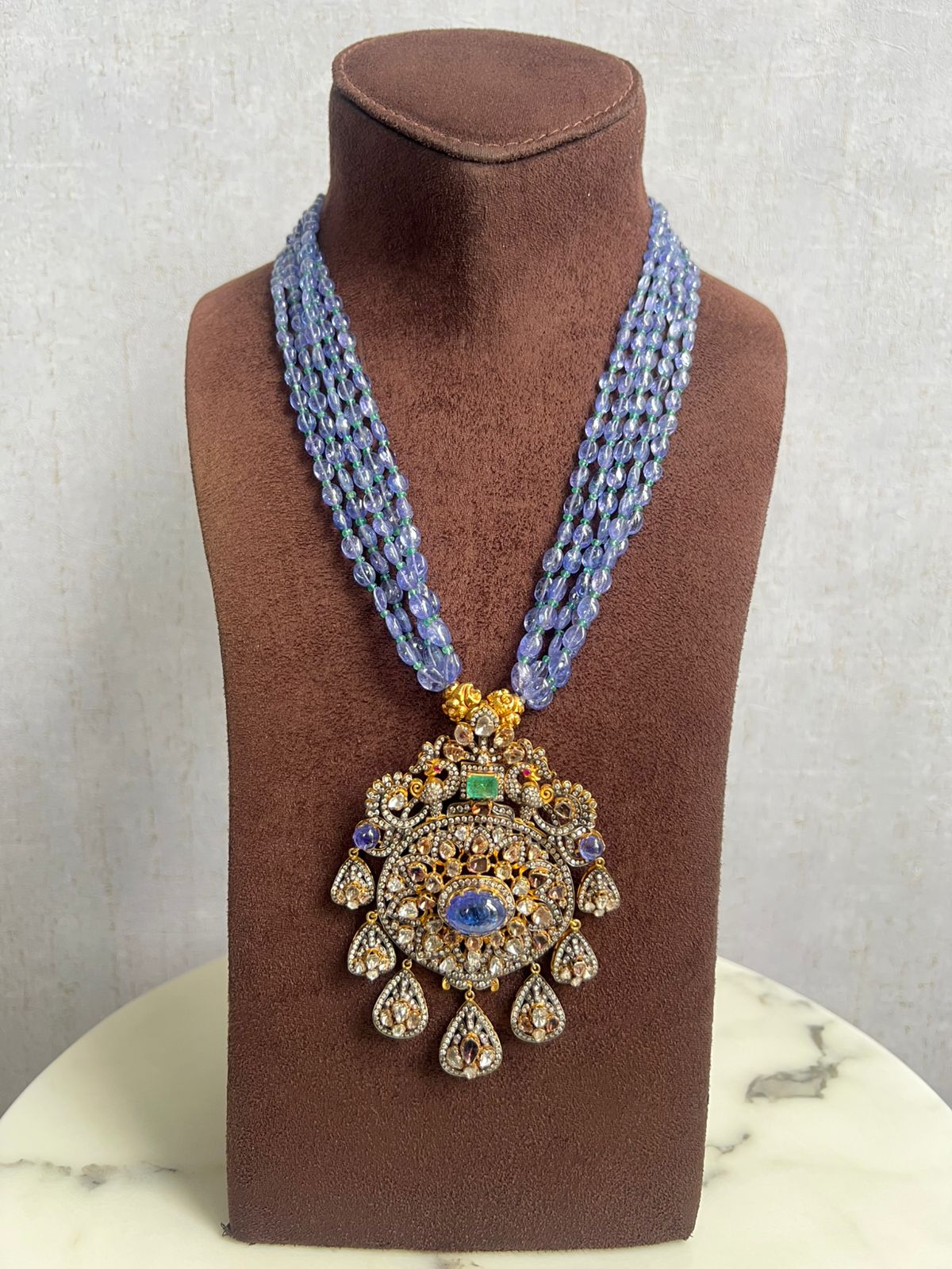 Peacock Motif semi Victorian pendant with Tanzanite beads Peacock Motif semi Victorian pendant with Tanzanite beads