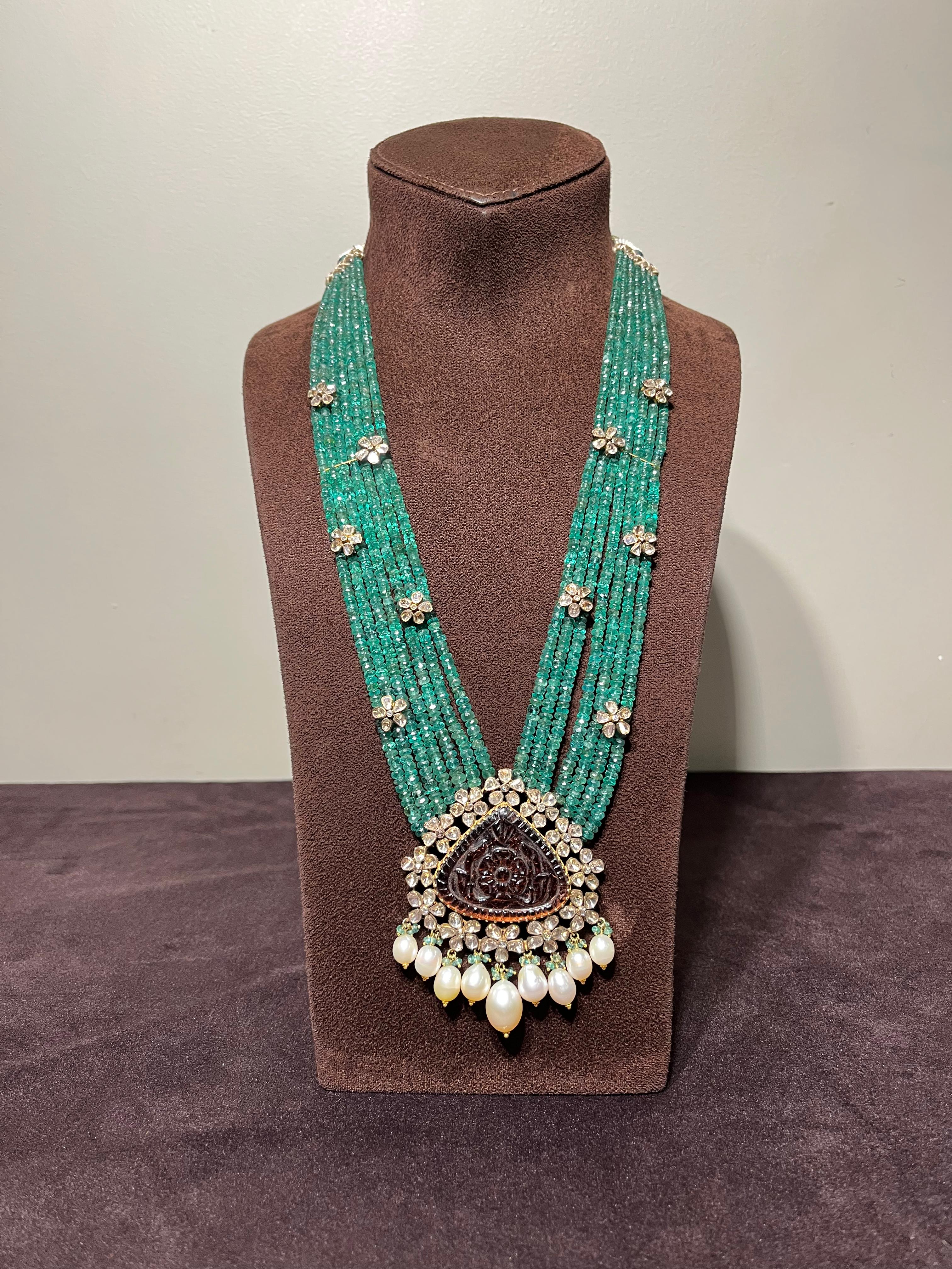 Carved Tourmaline Polki Pendant with Emerald Beads Carved Tourmaline Polki Pendant with Emerald Beads