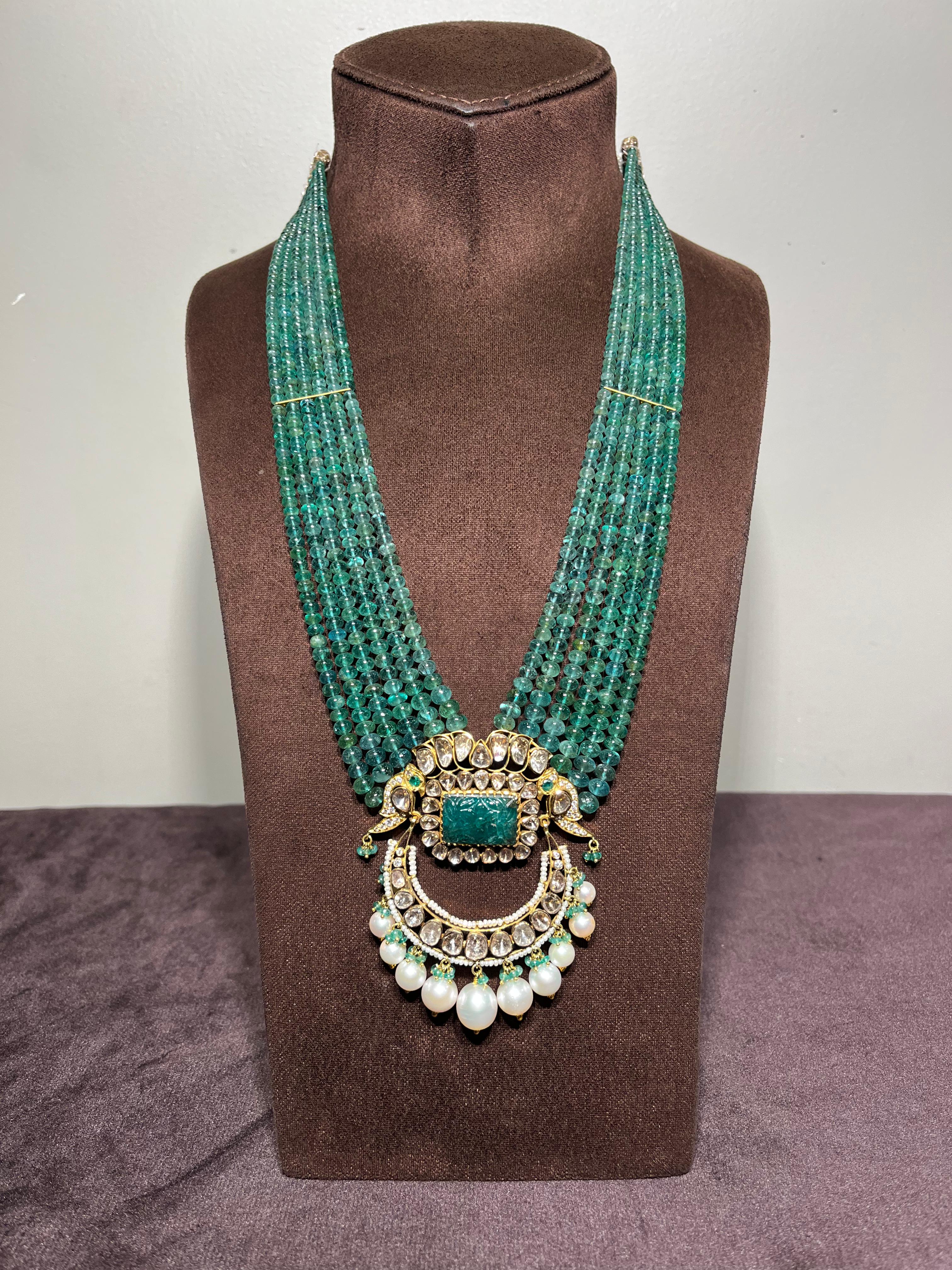 Chand Shaped Polki Pendant with carved Emerald and Emerald Beads Chand Shaped Polki Pendant with carved Emerald and Emerald Beads