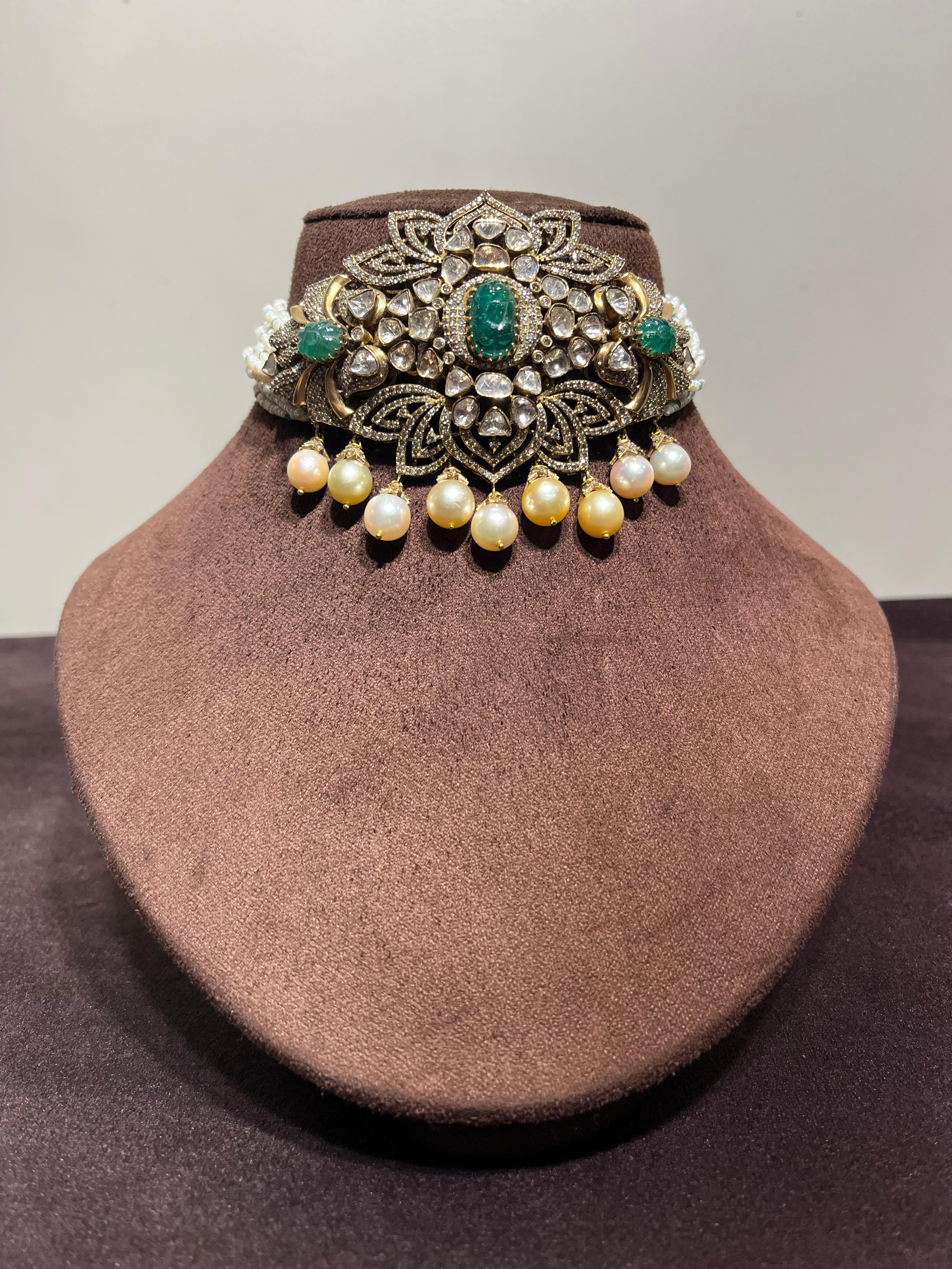Grand polki choker with pearls and carved emeralds Grand polki choker with pearls and carved emeralds
