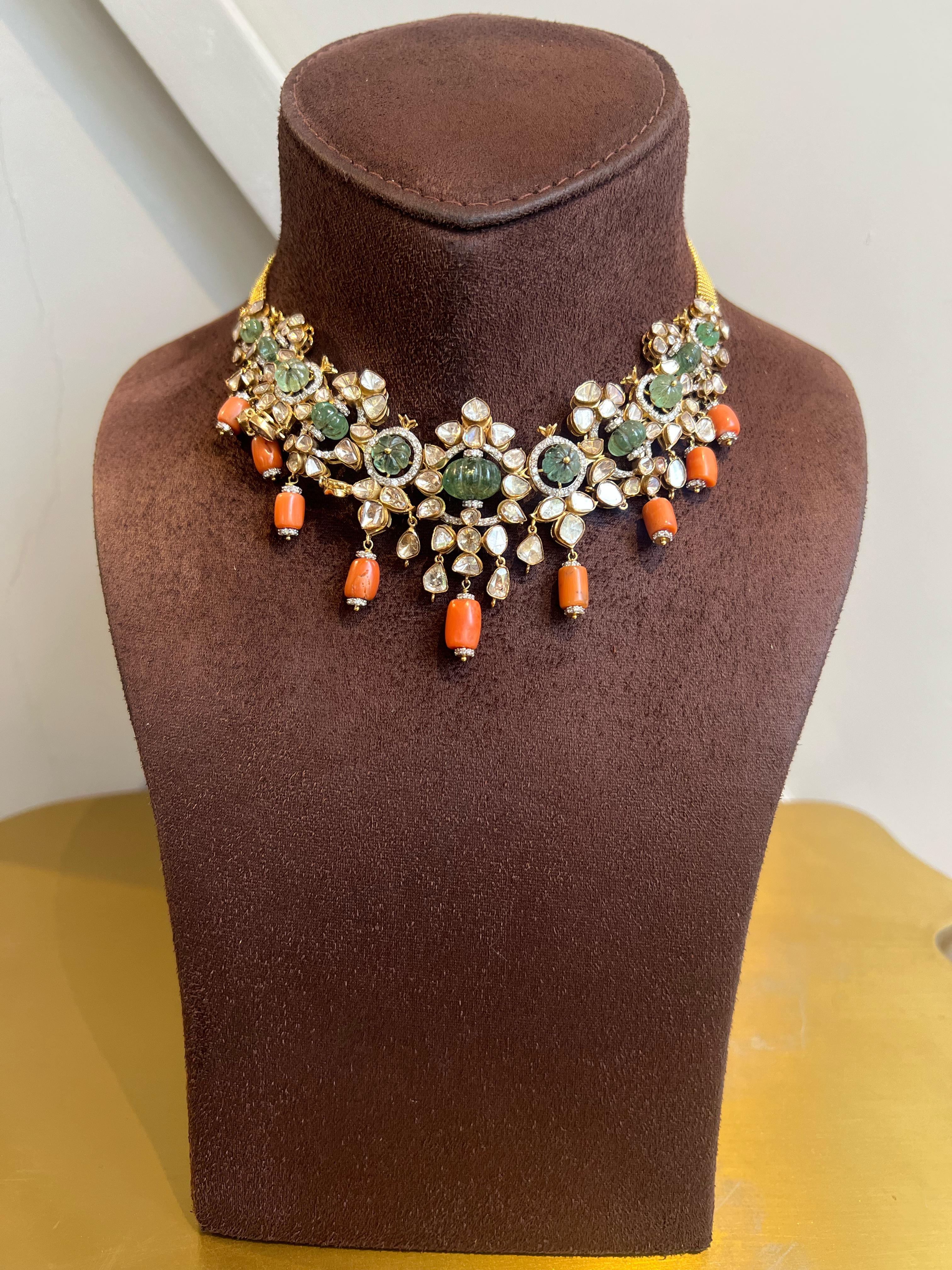 Polki Necklace studded with Emerald and Corals Polki Necklace studded with Emerald and Corals