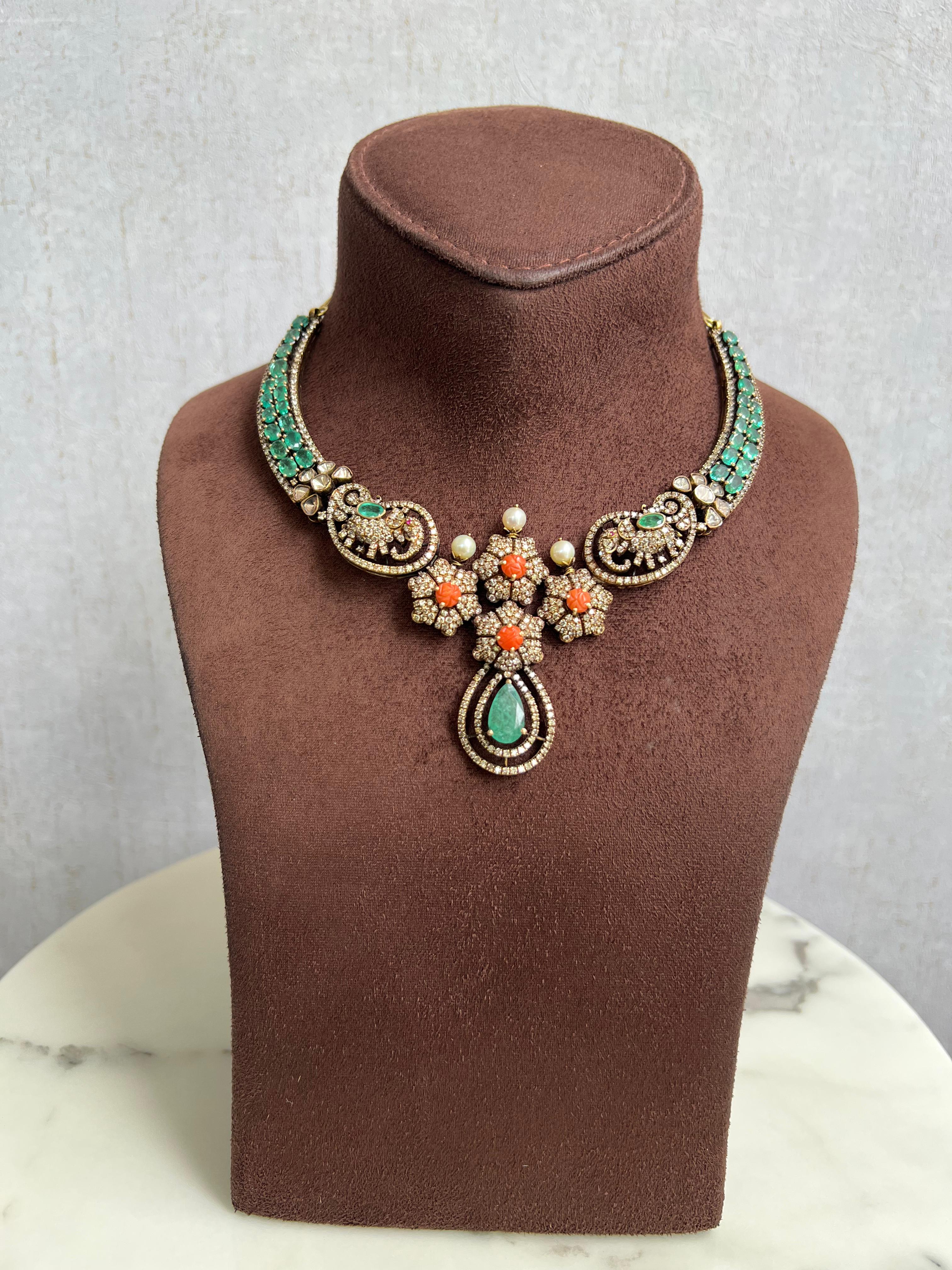 Emerald Studded Victorian Kanti with Elephant Motif Emerald Studded Victorian Kanti with Elephant Motif